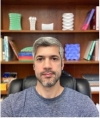 Compliant shell mechanisms and the geometry of isometric deformations