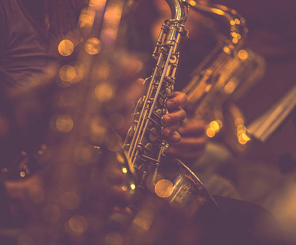 Saxophone Multiphonics as Dynamical Regimes: From Composition to Performer Control